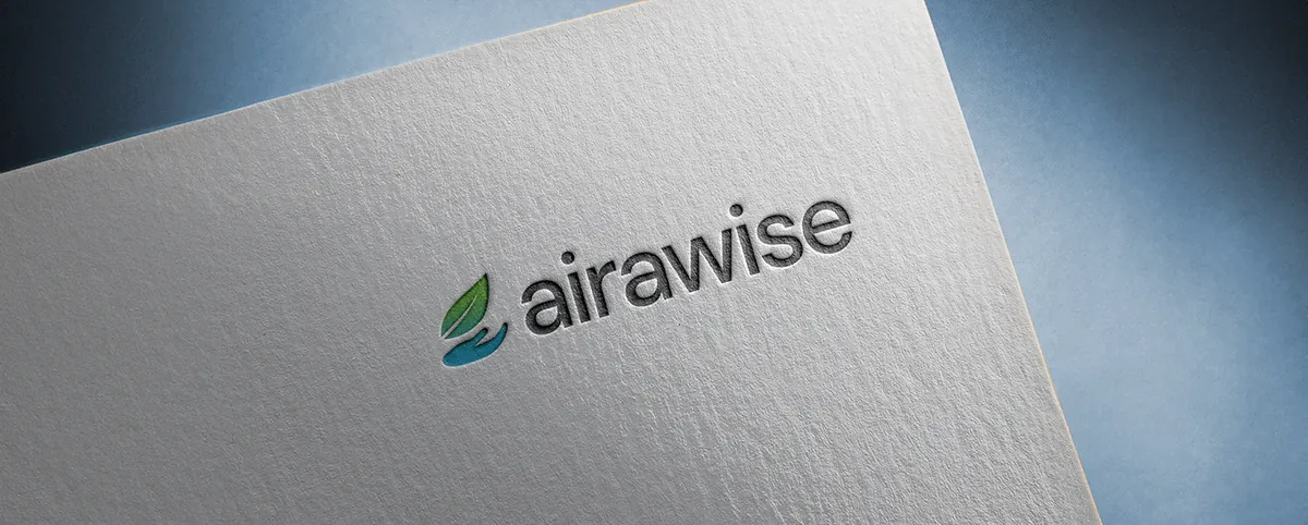 Airawise: logo with a green and blue leaf and a hand embossed in gray textured paper