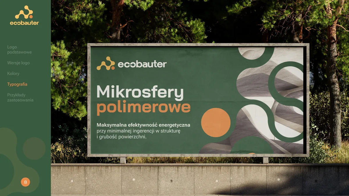 Ecobauter: zielony billboard na tle drzew z hasłem Mikrosfery polimerowe, logo i pomarańczowym kołem