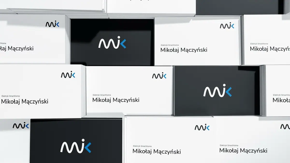 Elektromik: białe i czarne wizytówki z sygnetem mik i napisem Elektryk SmartHome