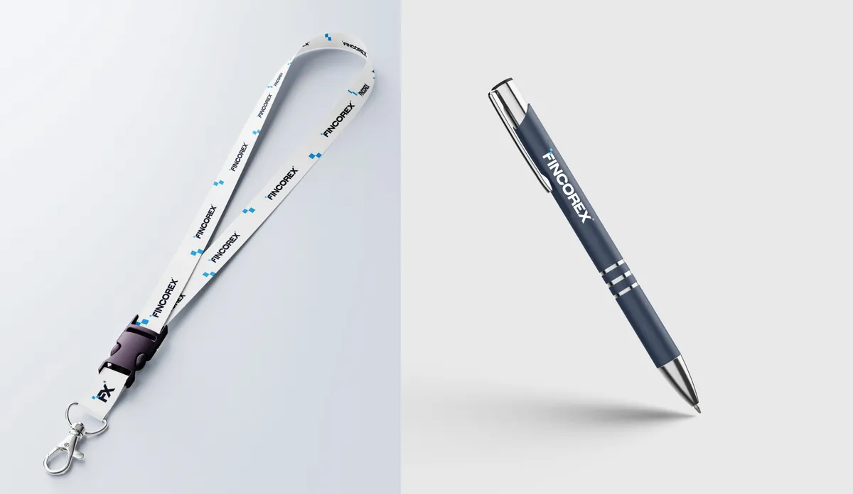 Fincorex: white lanyard with the logo and blue squares and a navy pen with a white logo