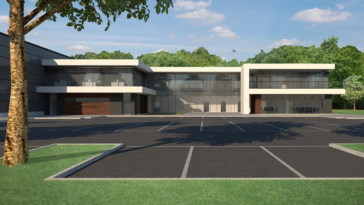 Nestfoam: wizualizacja 3D, front białego biurowca z przeszkleniami, przed nim pusty parking